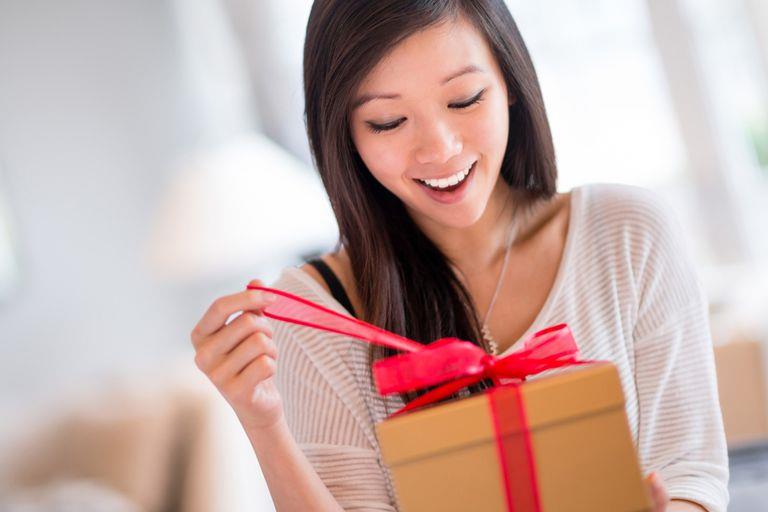 Woman Opening Gift
