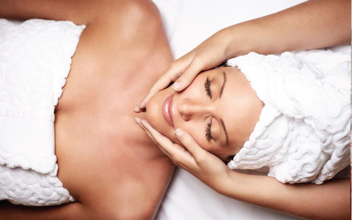 Woman Having Facial Spa